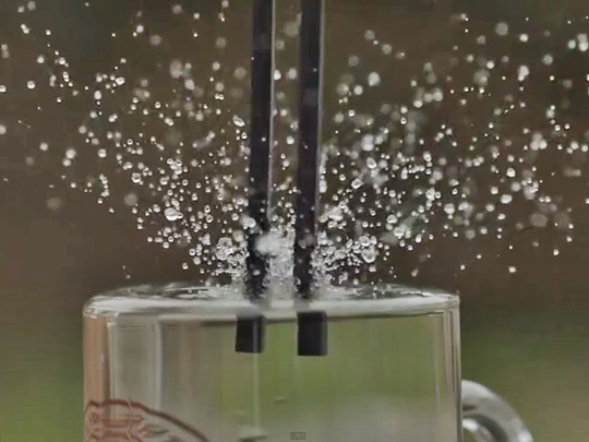 Tuning fork, water, slow motion, 