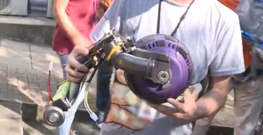 Ball-based Robots Assembled From Vacuum Parts Compete In a Race