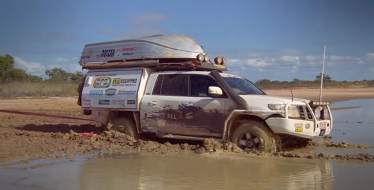 Watch Two Trucks Get Stuck in Mud Like Never Before