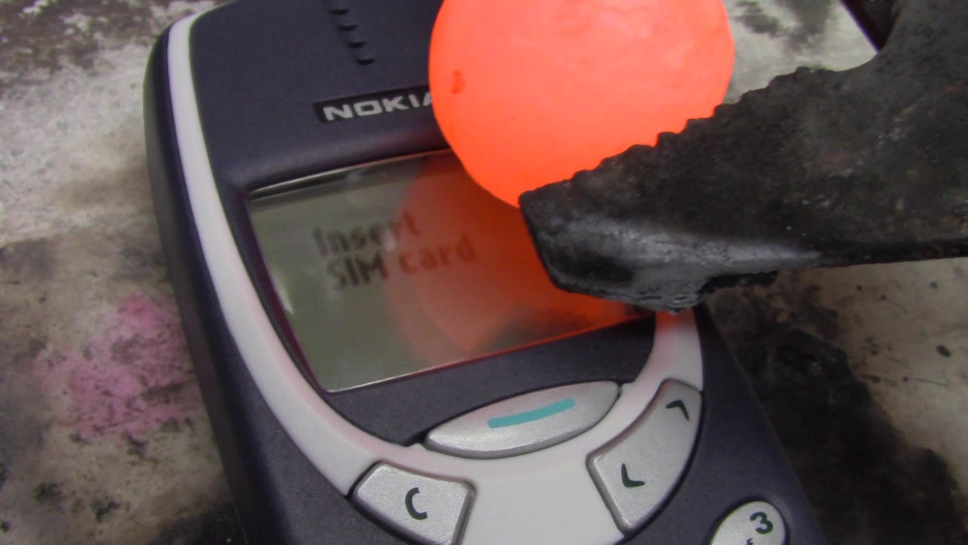 A red hot nickel ball VS Nokia 3310